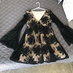 Lace black dress with flair